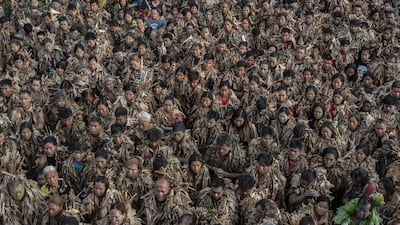Devotees covered in mud and dried banana leaves take part in the Taong Putik ("mud people") Festival in the village of Bibiclat in Aliaga town, Nueva Ecija province, Philippines. Each year, the residents of Bibiclat village in Aliaga town celebrate the Feast of Saint John by covering themselves in mud, dried banana leaves, vines, and twigs as part of a little-known Catholic festival. Getty Images