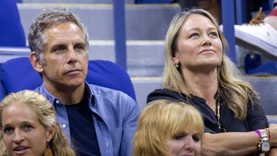 US actor-director Ben Stiller and his wife actress Christine Taylor watch from their seats. AFP