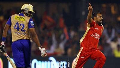Praveen Kumar celebrates after bowling Paras Dogra to complete a hat-trick.