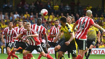James Ward-Prowse, No 16, of Southampton looks to play the ball against Watford on Sunday at Vicarage Road. Tom Dulat / Getty Images