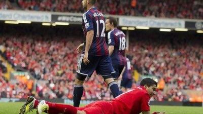 Liverpool's Luis Suarez is a player at the centre on the debates of diving in the Premier League. Jon Super / AP Photo