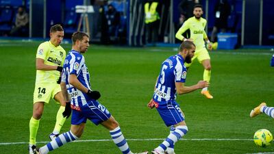 Marcos Llorente scores Atletico's first goal. Reuters