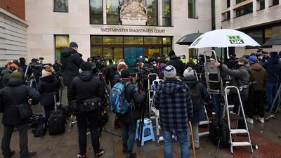 Members of the media and supporters of Julian Assange gather outside Westminster Magistrates court. AFP