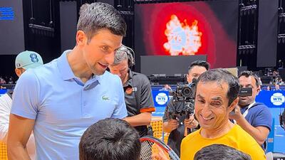 Sheikh Saeed and Novak Djokovic talk to young tennis fans at the World Tennis League in Dubai. Photo: Dubai Sports Council