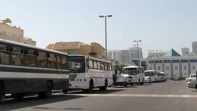 Parking spaces in Khalidiya are crowded with queues of buses.