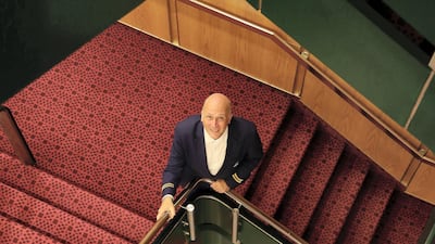 Peter Warwick, ex cruise director of the QE2 talking about some of his old memories at the Queen Elizabeth 2 ship in Dubai. Pawan Singh / The National