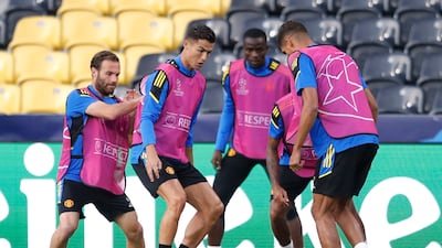Manchester United's Cristiano Ronaldo, Juan Mata and Raphael Varane. Reuters