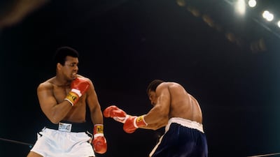 Muhammed Ali, left, and Ken Norton during their bout at the Sports Arena in San Diego, California, on March 31,1973. Getty