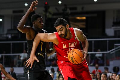 Omar Oraby of Al Ahly battle for possession with Hilario Alfredo Malale of CFV Beira during their Basketball Africa League match in Giza, Egypt. Getty Images
