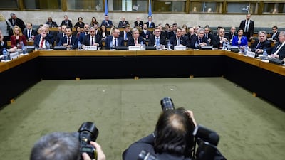 Cyprus peace talks get under way on January 12, 2017 as Turkish Cypriot leader Mustafa Akinci, third from left, UN Secretary-General Antonio Guterres, centre, and Greek Cypriot president Nicos Anastasiades gather at the United Nations Offices in Geneva, Switzerland. Philippe Desmazes/Pool Photo via AP