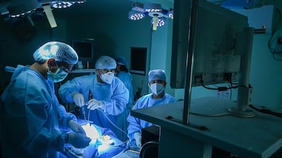 Doctors perform surgery to remove black fungus from a patient who recovered from Covid-19 at a hospital in Ghaziabad, near New Delhi. Indian doctors have now reported a case of green fungal infection, in addition to black, white and yellow. AFP