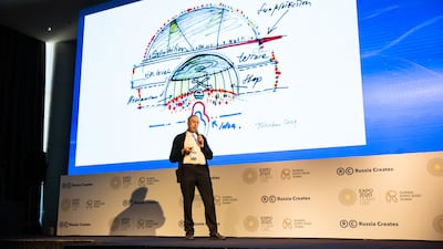 Architect Sergei Tchoban speaks of the concept of the Russian pavilion during a presentation.