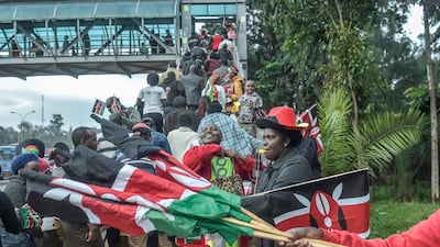 Hawkers and members of the public gather outside the Kasarani Stadium on November 28, 2017 to attend the inauguration ceremony of Kenyan president. Simon Maina / AFP