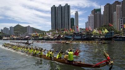 Participants compete in a dragon boat race during the annual Tuen Ng in Hong Kong on Saturday. Tyrone Siu / Reuters