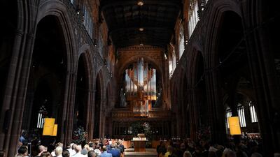 People attend the Manchester Arena National Service of Commemoration at Manchester Cathedral. Paul Ellis/Pool via Reuters