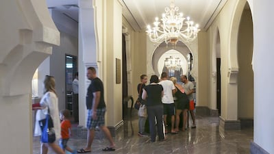 Tourists walk the corridors of the Ajman Saray in Ajman. Hotel managers in the UAE’s smallest emirate say the vast majority of their guests are from Russia and eastern Europe. Sarah Dea / The National