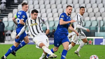 Juventus' forward Alvaro Morata scores their third goal. AFP
