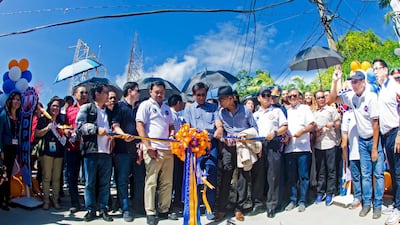 Filipino Environment Secretary Roy Cimatu leads the ceremonial opening. EPA