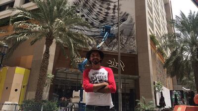 Eduardo Kobra painting his mural at Al Ghurair Centre. (Courtesy: Seven Media)
