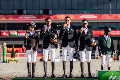 Sheikha Latifa, left, with the UAE showjumping team at the 2026 Asian Games. Photo: Emirates Jumping