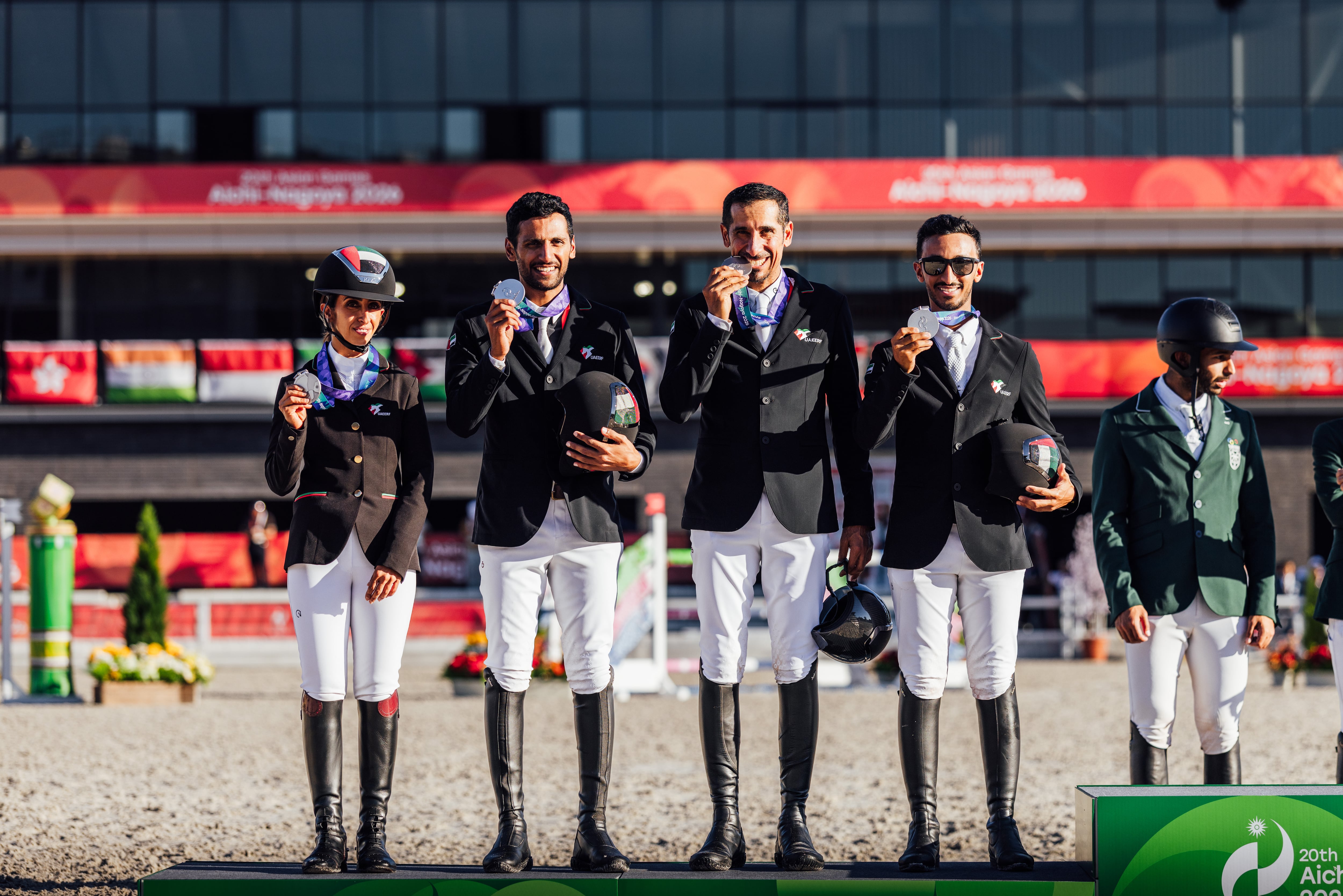 Sheikha Latifa, left, with the UAE showjumping team at the 2026 Asian Games. Photo: Emirates Jumping