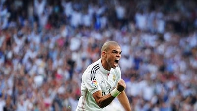 Pepe of Real Madrid celebrates after scoring his team's second goal against Barcelona at the Bernabeu on Saturday. Denis Doyle / Getty Images