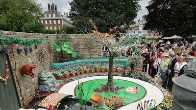 LONDON, ENGLAND - MAY 19: Isabella Blake-Thomas, 6, from London walks through television presenter James May's Paradise in Plasticine garden at Chelsea flower show on May 19, 2009 in London, England. The internationally renowned horticultural show runs from May 19-23, showcasing the latest gardening trends including several 'Credit Crunch' gardens. (Photo by Dan Kitwood/Getty Images)