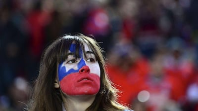 A Chile fan shown on Thursday night during the 2018 World Cup qualifying match in Santiago against Brazil. Martin Bernetti / AFP