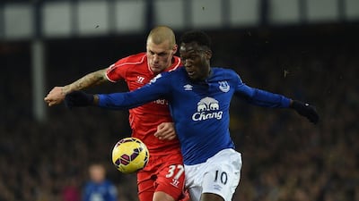 Liverpool's Martin Skrtel, left, vies with Everton's Romelu Lukaku for the ball during their Premier League match on Saturday. Paul Ellis / AFP / February 7, 2015