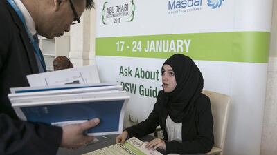 An attendee looks over the day’s programme at the International Renewable Energy Agency assembly. The assembly is Irena's ultimate decision-making authority and is made up of one representative from each member. Silvia Razgova / The National
