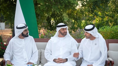 Sheikh Mohammed bin Rashid and Sheikh Mohamed bin Zayed speak with Sheikh Hazza bin Zayed, Vice Chairman of the Abu Dhabi Executive Council, at an Al Maqam Palace barza. Hamad Al Kaabi / Ministry of Presidential Affairs