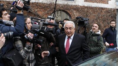 Former International Monetary Fund boss Dominique Strauss-Kahn leaves his hotel in Lille, northern France, on Thursday, February 12, 2015 as he goes on trial for sex charges at a court. Half-way through his three-week trial for aggravated pimping, the ex-IMF boss has been forced under days of judicial questioning to explicitly detail his history of, in his own words, "libertine" sexual practices. Michel Spingler / AP Photo