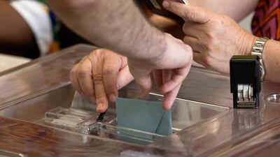 A voter casts his ballot. EPA