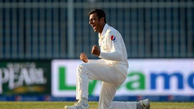 Shoaib Malik of Pakistan celebrates dismissing Ian Bell of England during Day 4 of the third Test in Sharjah. Gareth Copley / Getty Images / November 4, 2015