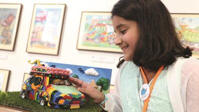 Minhal Adnan Sami with her 3D clay model. Ken Ishii / Getty Images
