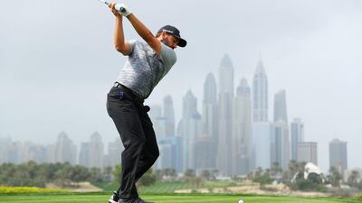 Sergio Garcia tees off on the eighth hole during the opening round of the 2017 Omega Dubai Desert Classic. Warren Little / Getty Images