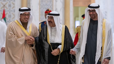 President Sheikh Mohamed, Sheikh Mansour bin Zayed, Vice President, Deputy Prime Minister and Chairman of the Presidential Court, and Kuwaiti Emir Sheikh Meshal laugh during a state visit reception at Qasr Al Watan, Abu Dhabi. Abdulla Al Neyadi / UAE Presidential Court