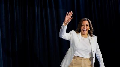 US Vice President and Democratic presidential candidate Kamala Harris waves during a campaign rally in Michigan. Reuters
