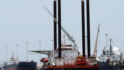 An oil rig platform at dock in Abu Dhabi. China is bidding for a partnership with the emirate on oil. Andre Forget / The National