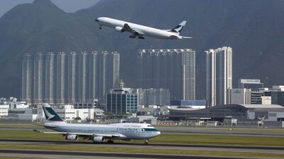 A Cathay Pacific Airways passenger plane takes off at the Hong Kong Airport. the carrier is struggling in the face of Chinese and Middle East competition. Tyrone Siu / Reuters
