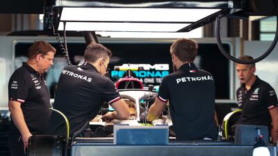 Staff prepare for the F1 race. Victor Besa / The National