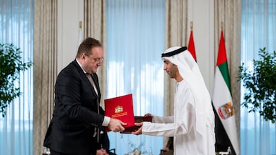 Dr Thani Al Zeyoudi, UAE Minister of State for Foreign Trade, and Vladimir Simonyak, Secretary General of the Ministry of Economy of Slovakia, exchange a memorandum of understanding on economic co-operation between the UAE and Solvakia