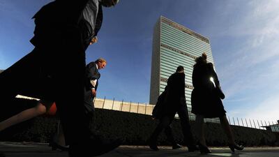 Delegates walk past the UN building in New York (AFP PHOTO/Jewel SAMAD)
