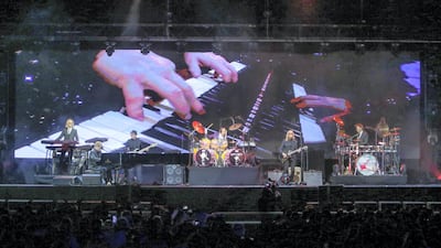John’s keyboard playing was frequently visually highlighted with a camera angled at the keys. Victor Besa for The National