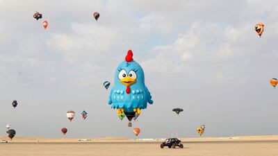 Hot air balloons rise during the Qatar Hot Air Balloon Festival. AFP