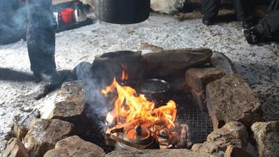 Stopping for a soup break between horseriding and husky sledding. Photo by Rosemary Behan