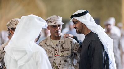 Sheikh Mohamed and Sheikh Hamdan speak to other armed forces members. Ryan Carter / UAE Presidential Court