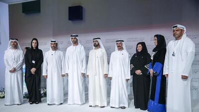 Sheikh Mohammed bin Rashid, Vice President and Ruler of Dubai, centre, with Mohamed Al Mahmood, chairman and managing director of Abu Dhabi Media, fourth from left, during the forum. Sheikh Mohammed told the forum that the key to developing local media was the inclusion of young Emiratis in the industry. “We expect our media to lead and open doors for our young talents. As we need creative engineers, doctors and managers, we also need creative journalists and media workers.”