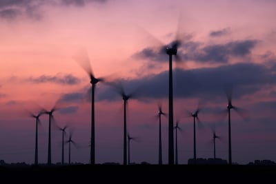 Wind turbines are expected to meet a large share of the world's future electricity demand but the IEA says more storage and connecting grids are needed on land. AFP