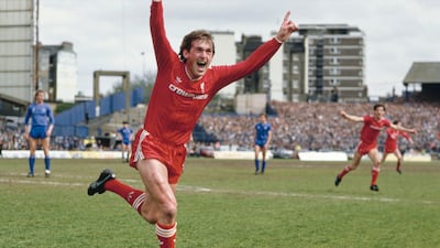 Liverpool player-manager Kenny Dalglish celebrates after scoring the winning goal to secure the Division One Championship for the 1985/86 season after beating Chelsea 1-0 at Stamford Bridge on May 3, 1986. Allsport